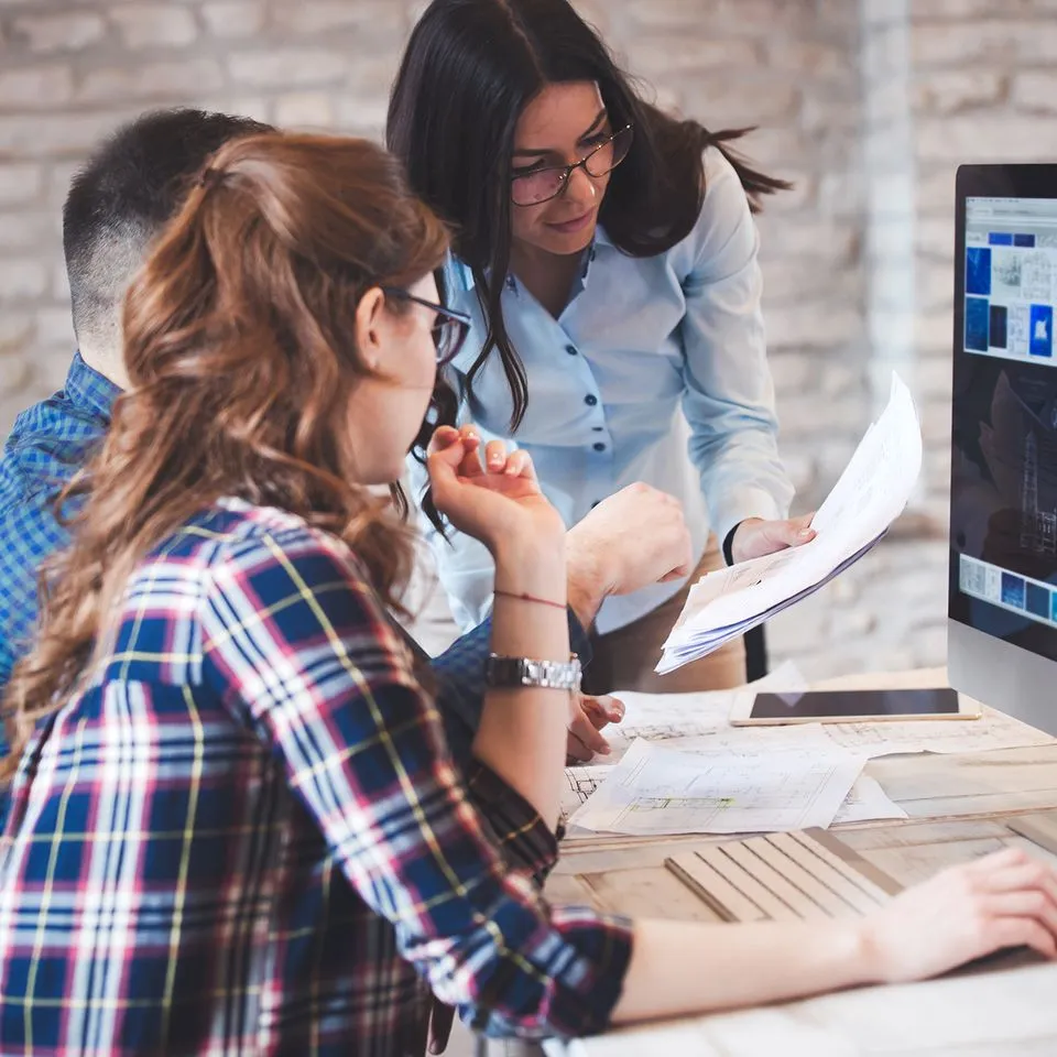 A marketing design team planning content together
